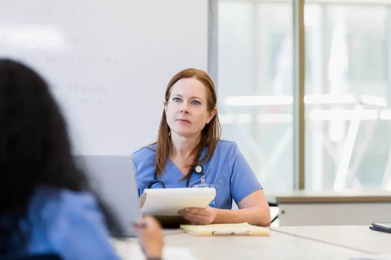 Female healthcare professional in a meeting